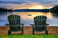 Wooden Chairs at Sunset on Beach
