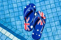Sandals Floating in a Pool