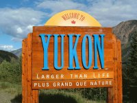 Yukon sign among the Road