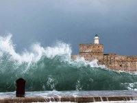 Huge Wave around the Lighthouse