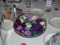 Centerpiece of Floating Purple Flowers