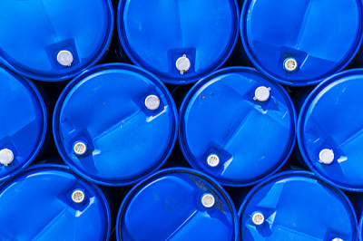 Blue chemical barrels stacked up.
