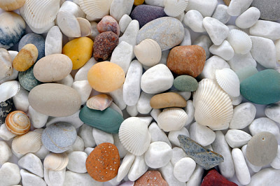 Light sea multi-colored stones close up. Backgroun