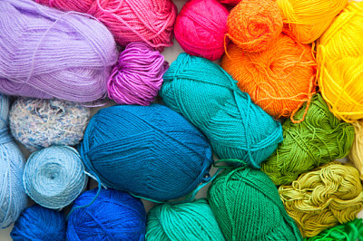 Colored balls of yarn. View from above. Rainbow co