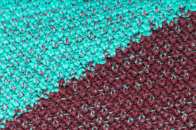 Colorful knitted woolen fabric as background