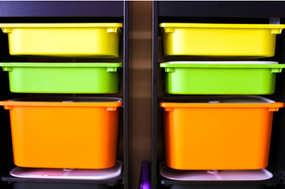 2 rows of colorful plastic containers in children