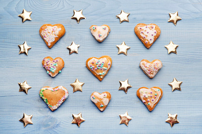 Gingerbread cookies on blue wooden background