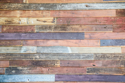 Multicolored teak wood wall background.