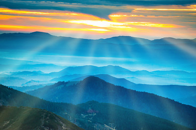 Landscape with blue mountains under beautiful oran