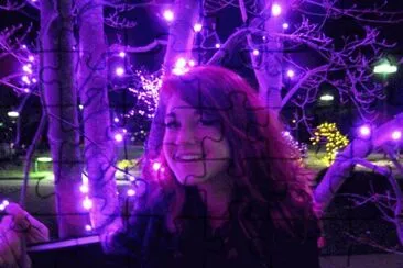 Glowing Girl Under Purple Lights