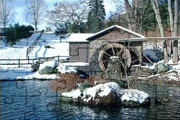 פאזל של Waterwheel fence in Wintertime