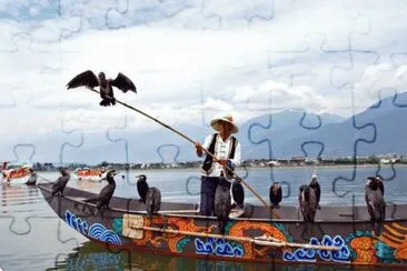 Fisherman with his Birds  Yunnan  China jigsaw puzzle