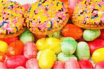 sweet-cakes-and-colourful-gums-at-the-background-c jigsaw puzzle