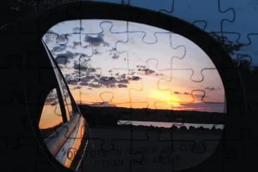 Sunset in the rearview mirror jigsaw puzzle