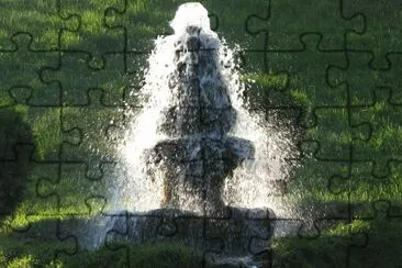 Water fountain in setting sun