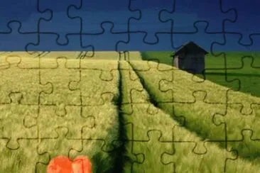 green field under a blue sky jigsaw puzzle