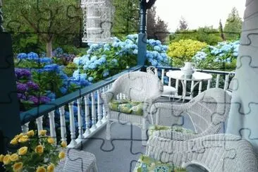 Beautiful Hydrangeas Surrounding Charming Porch