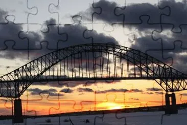 Sunset over the frozen Miramichi River jigsaw puzzle