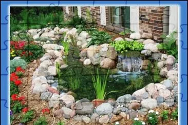 QUE JARDIN!  TODA UN CHULADA.  TIENE HASTA SU PEQUEÃ‘A CASCADA