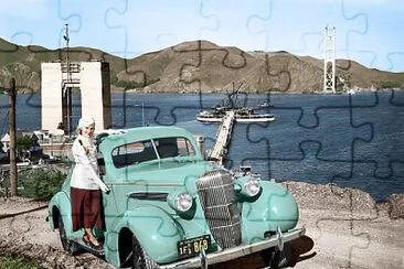 1935 Oldsmobile coupe and Golden Gate Bridge under