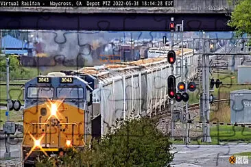 CSX-3043 passing Waycross,GA/USA depot. jigsaw puzzle