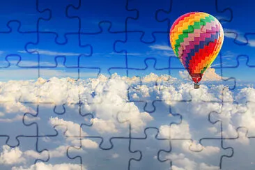 Hot Air Balloon over Clouds jigsaw puzzle