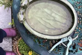 Birdbath on garden table