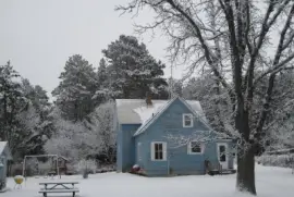 little blue house in the country