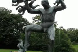 Sculpture of Man balancing babies jigsaw puzzle