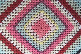 crocheted rug- pink center