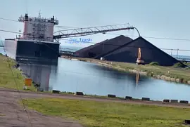 m/v Burns Harbor unloading (1,000 ft long)