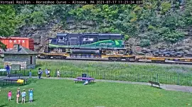 HSC NS-6220  on flat car transport to Altoona shop