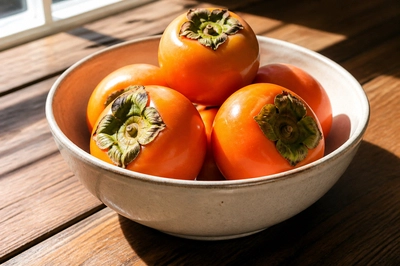 Persimmons in Bowl(grok)