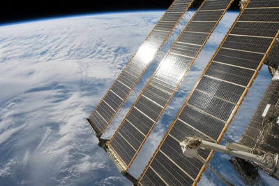 Solar Arrays Earth Clouds(grok)