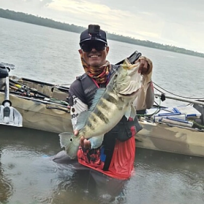O Jovem pescador e o tucunaré