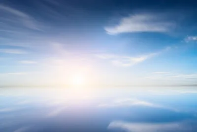 Sunrise mirroring at sea