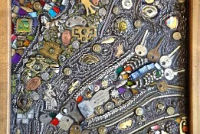 mosaic with keys, chain, pins, coins, and other