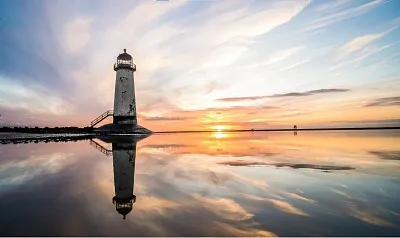 Faro al atardecer jigsaw puzzle