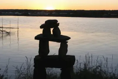 Inukshuk on the riverbank