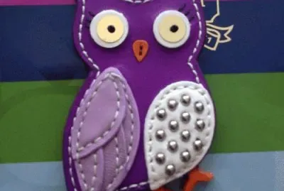 Purple Learher Owl Keychain-$145 Really! jigsaw puzzle