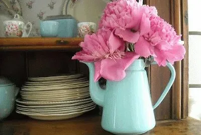 flores no bule branco