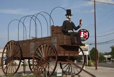 Abe Lincoln sits on a wagon on route 66  Illinois