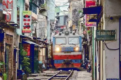 Railroad in a busy street  Hanoi  Vietnam