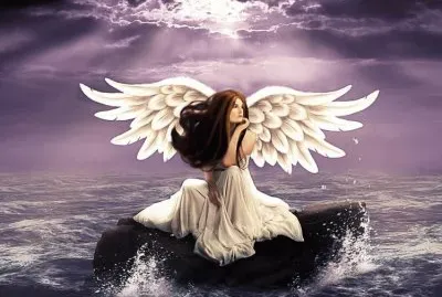 Ãngel en una roca sobre el mar