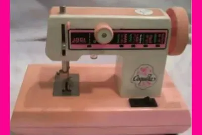 JUGUETE-MAQUINA DE COSER