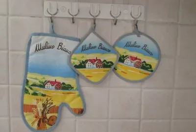 Agarraderas de cocina de regalo con las compras