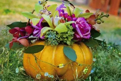 Exotic Floral Arrangement in a Pumpkin
