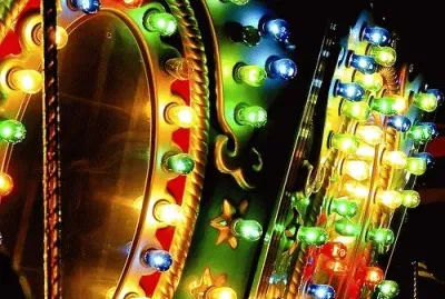 close up of carnival lights on carousel