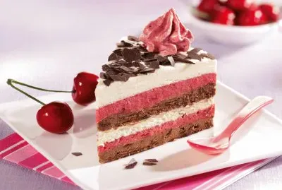 cake and cheryes on the side