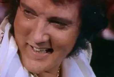 ELVIS IN CONCERT 77